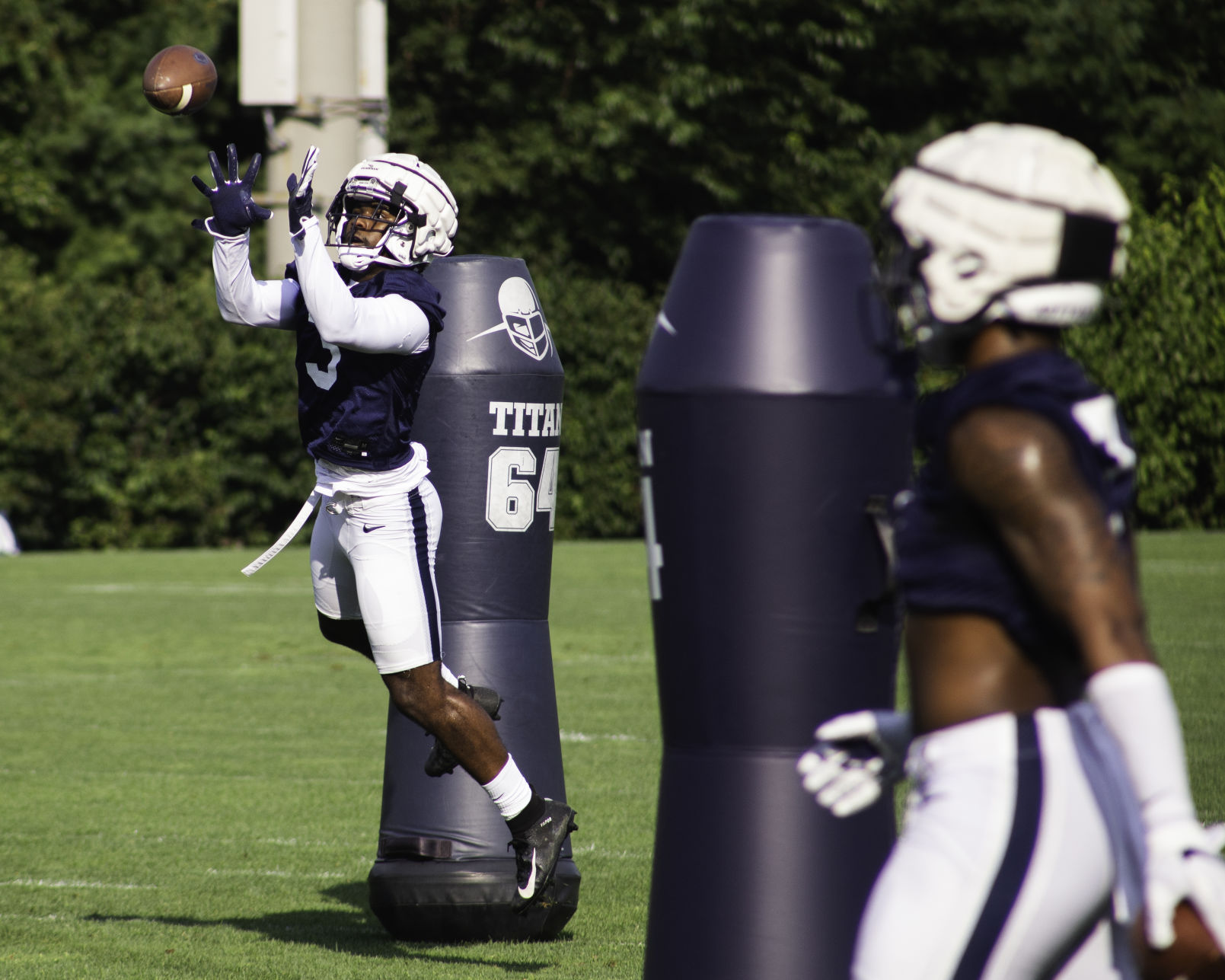 Football Media Day, Johnson (3), catches a ball